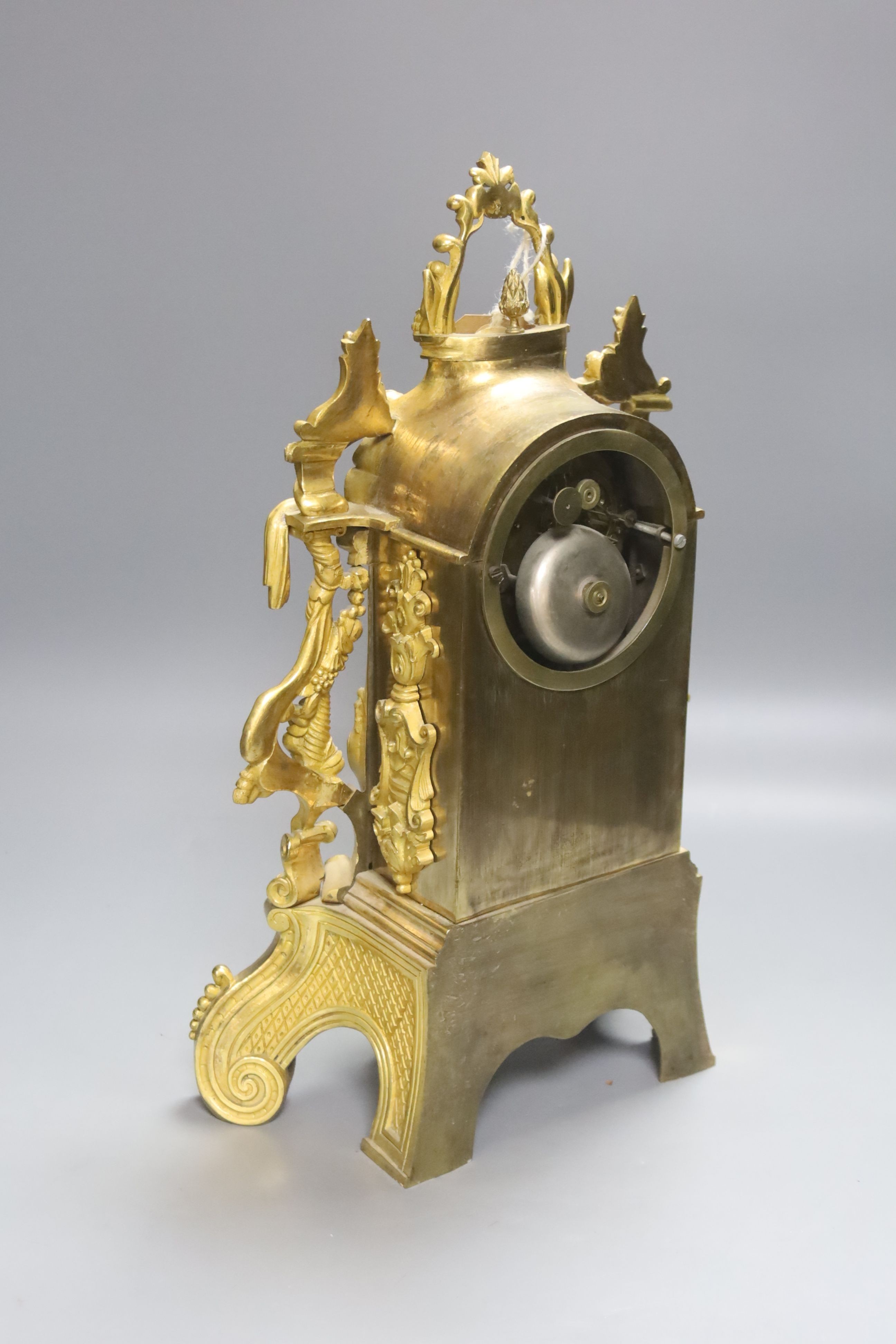 A 19th century French ormolu mantel clock, mounted with an angel, 39cm